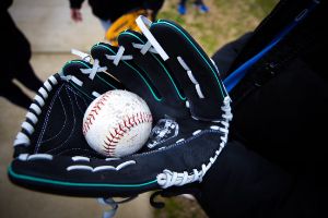 Baseball mitt holding a ball.